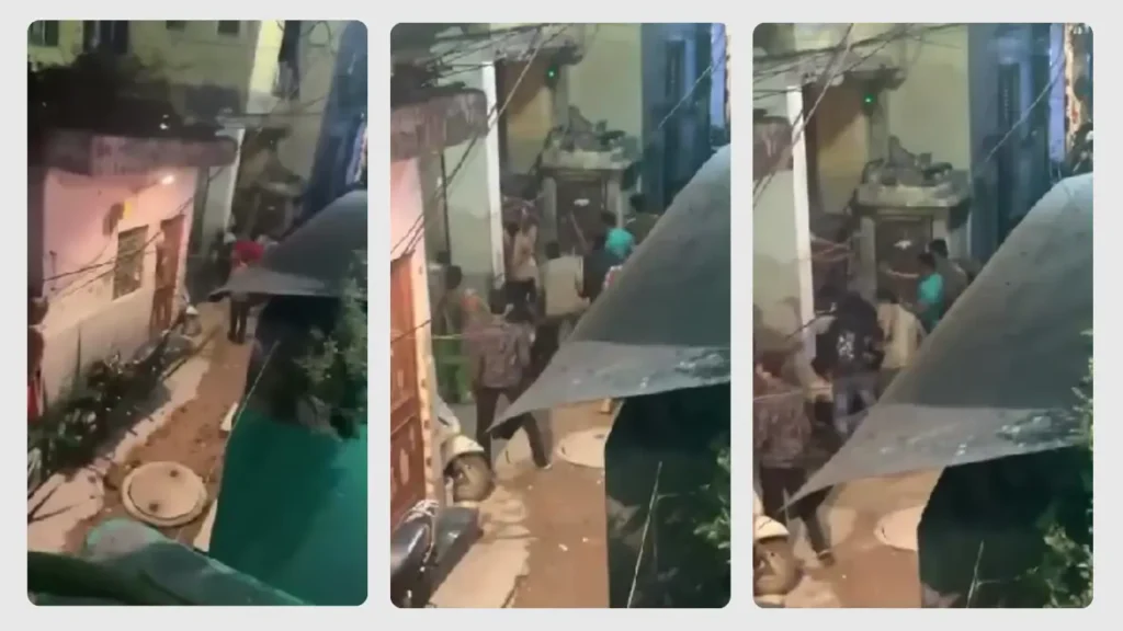 People seen moving through a narrow neighborhood lane in Delhi where the Tarun Kumar incident reportedly occurred.